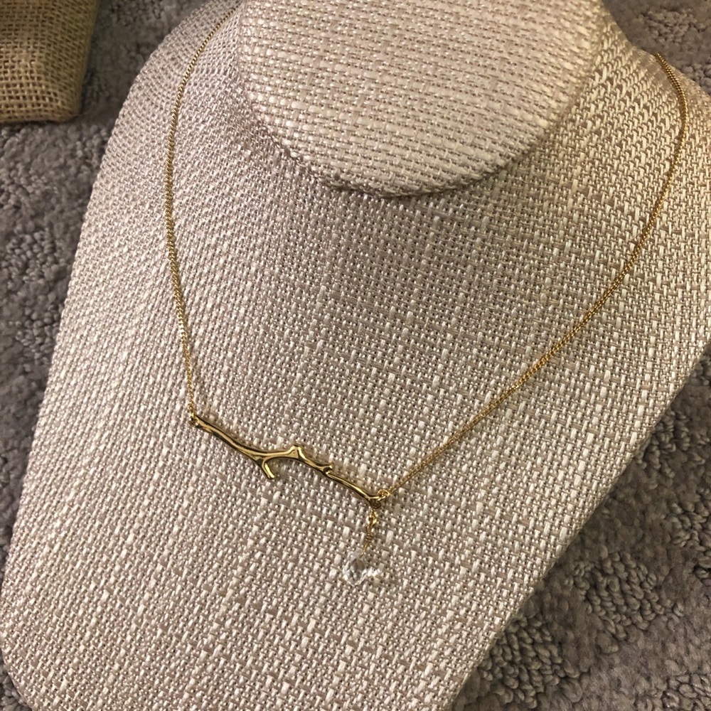 Gold friendship branch with jewel
